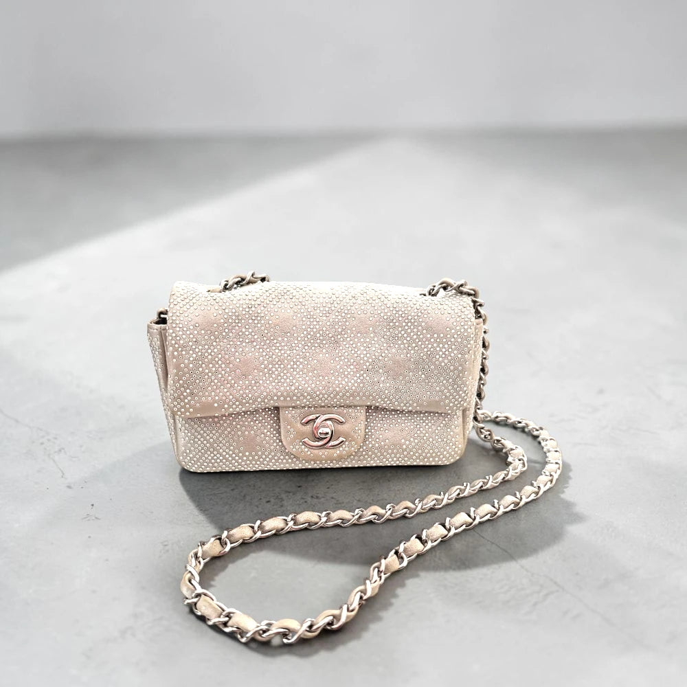 Chanel | Mini Iridescent and Studded Calfskin Flap crossbody bag