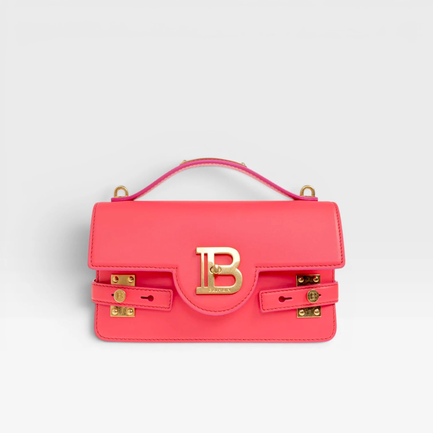 Balmain | 24 B-Buzz leather crossbody bag in Pink