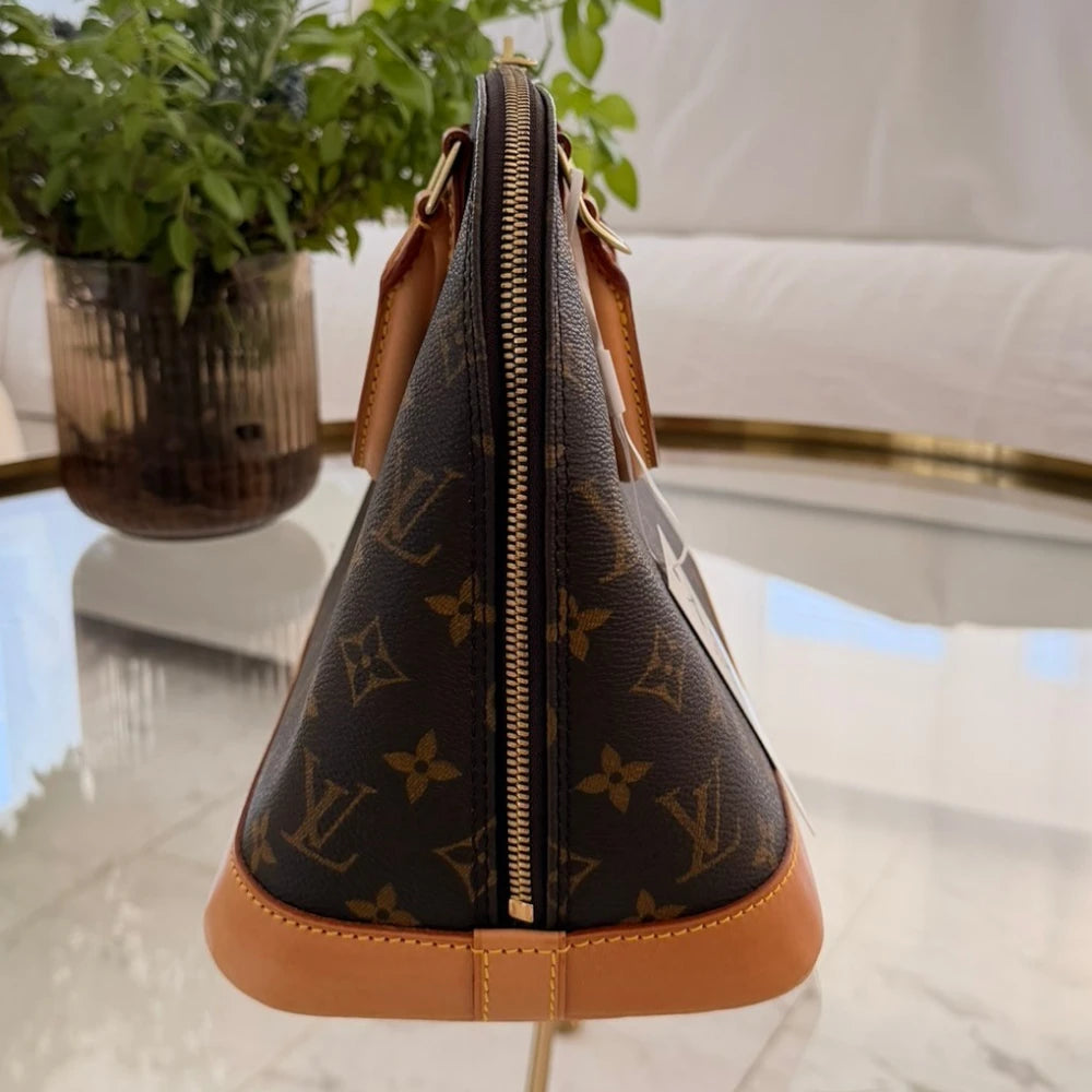 Louis Vuitton | Alma PM monogram handbag