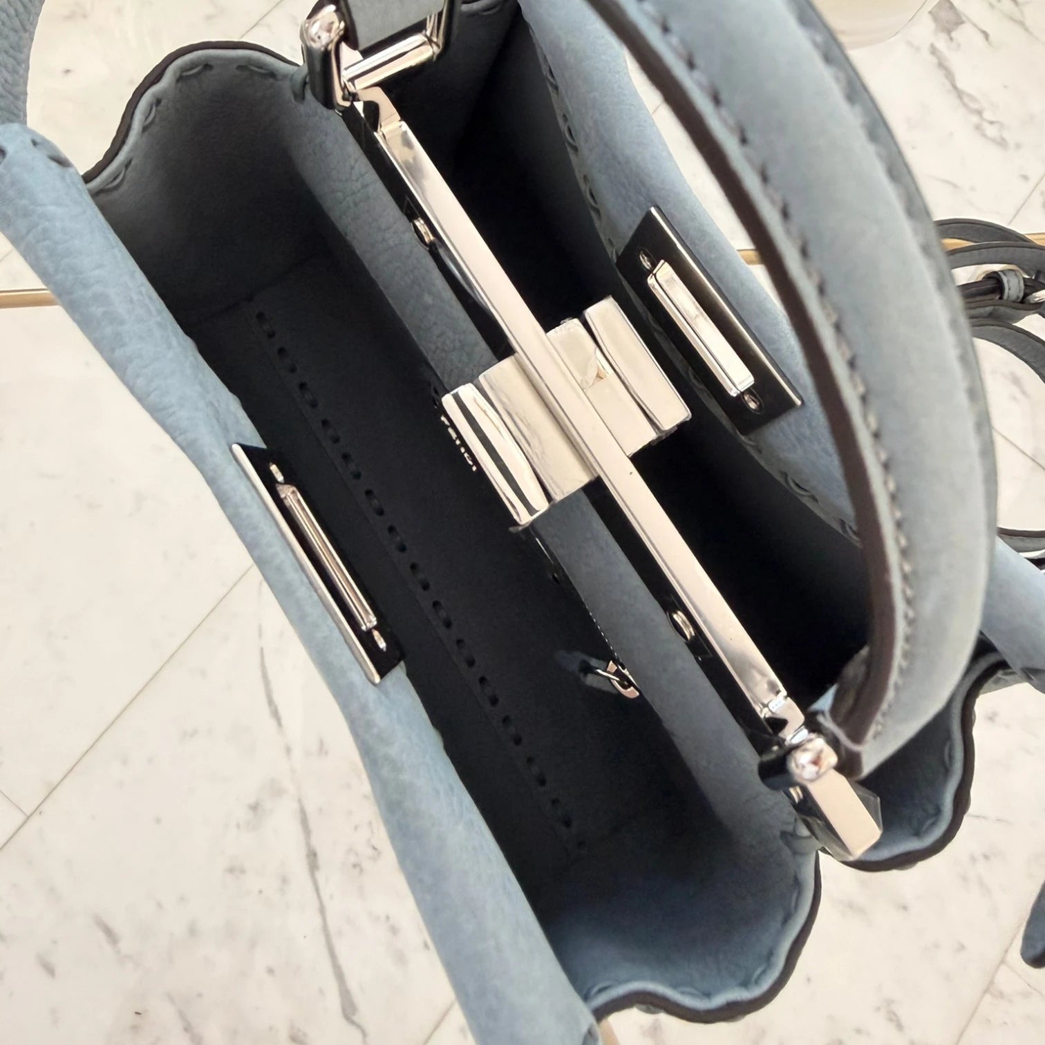 Fendi Mini Peekaboo interior two-compartment design with leather lining available in Cyprus at HOUSE of MICY