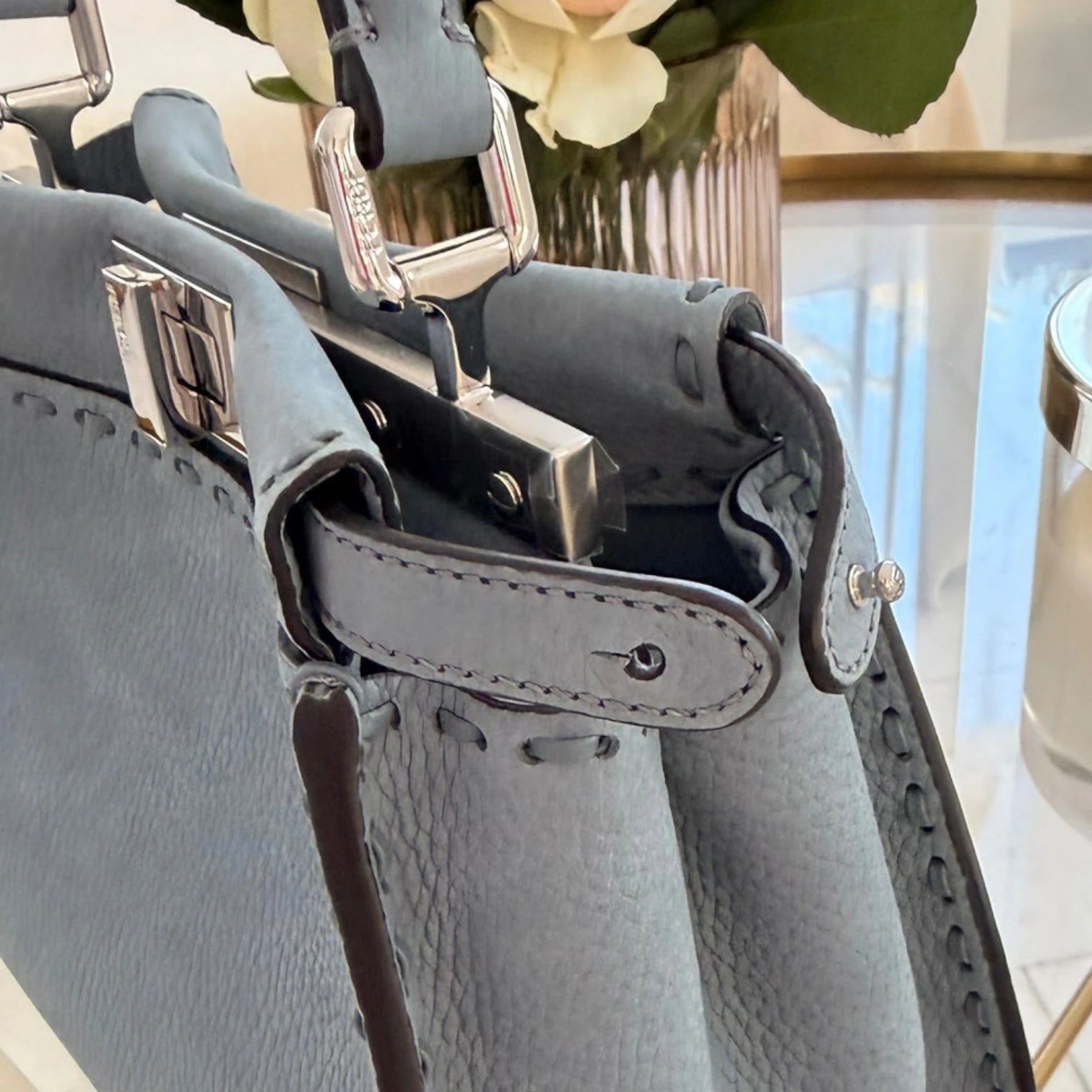 Close-UP of Fendi Mini Peekaboo tote bag, structured leather with double clasp available in Cyprus at HOUSE of MICY