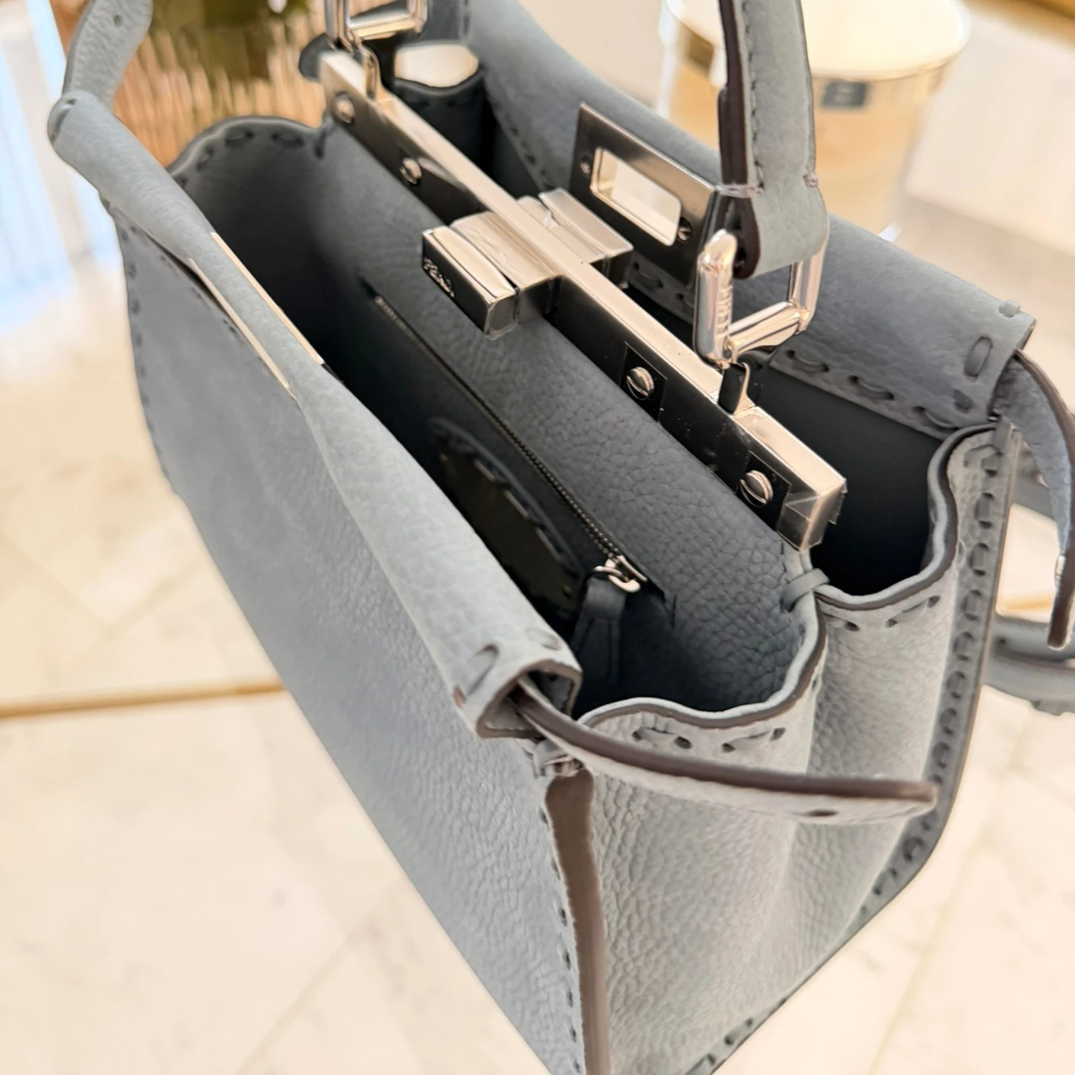 Two compartments of Fendi Mini Peekaboo tote bag, structured leather with double clasp available in Cyprus at HOUSE of MICY