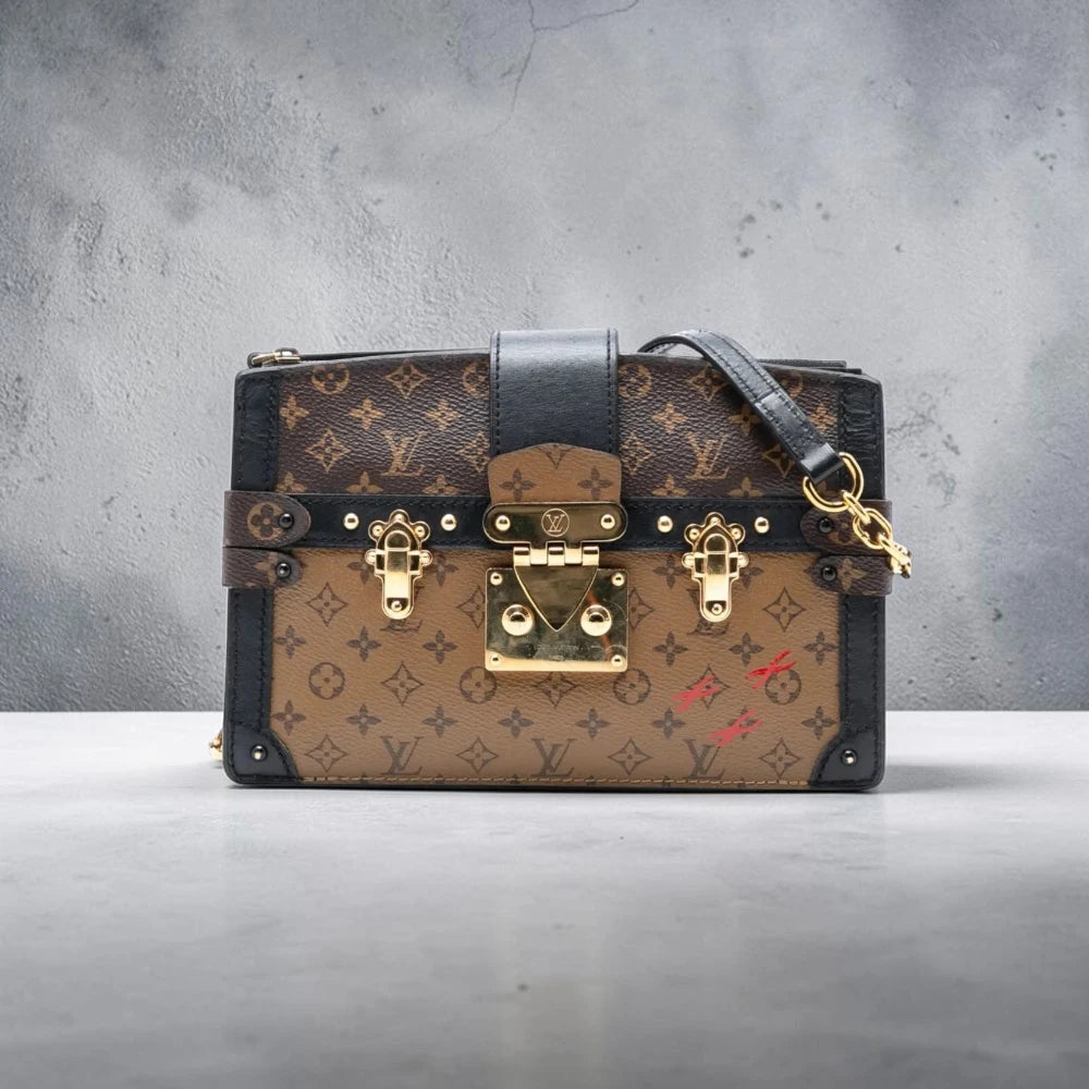 Louis Vuitton  | Monogram Reverse Trunk Clutch crossbody bag