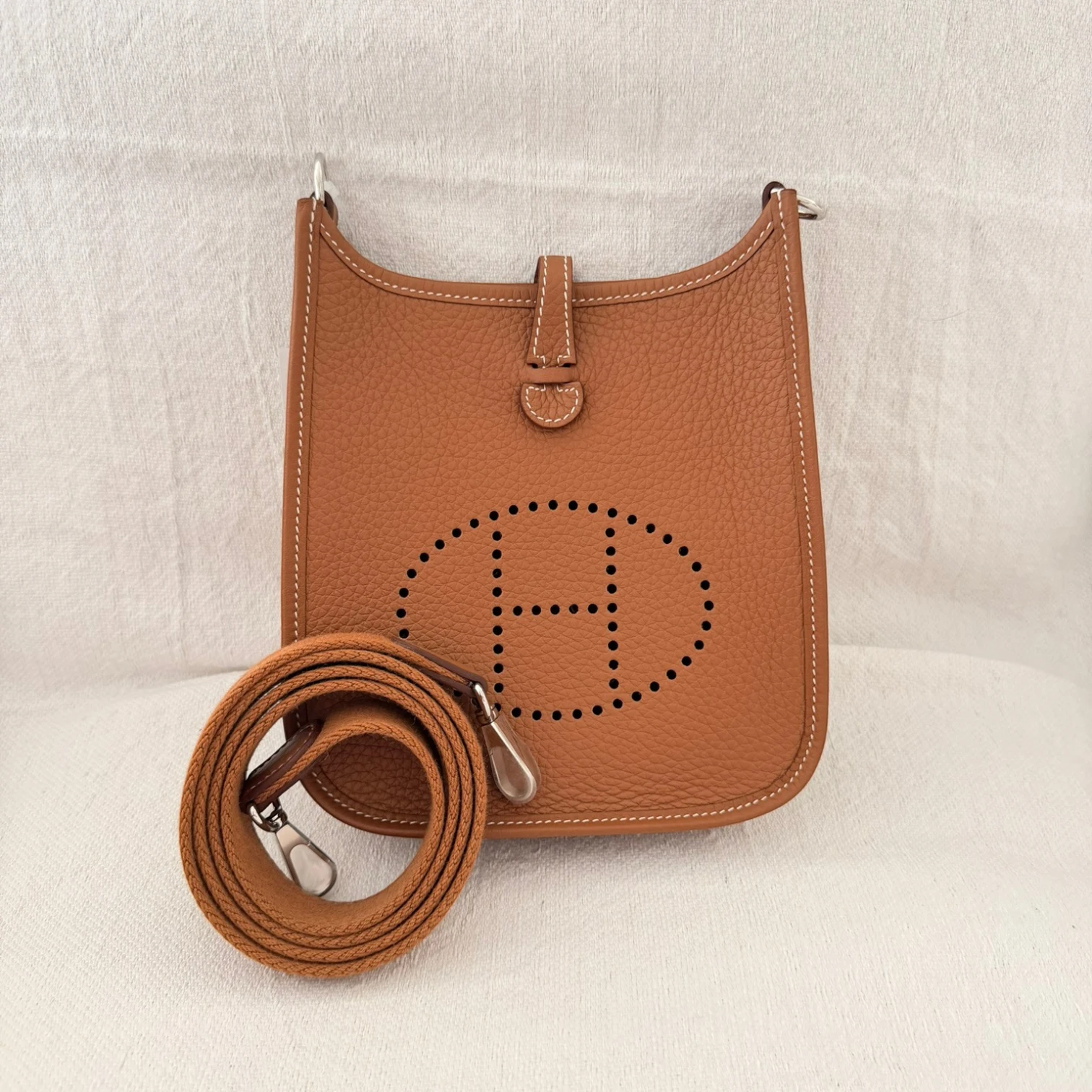 Hermès 2024 Evelyne 16 crossbody bag in Clemence leather, perforated H logo, with a crossbody strap, available in Cyprus at HOUSE of MICY