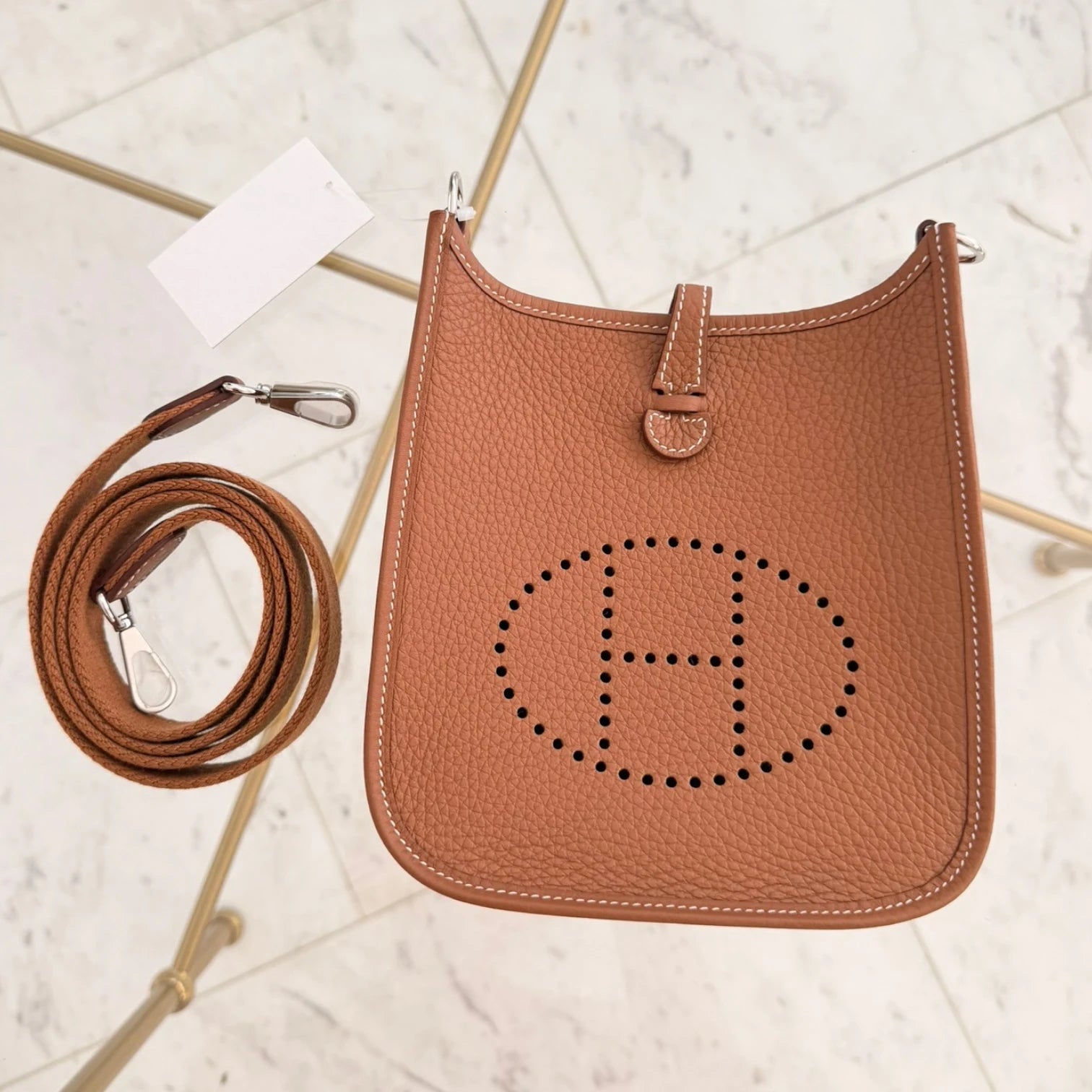 Hermès 2024 Evelyne 16 crossbody bag in Clemence leather, perforated H logo, with a crossbody strap, available in Cyprus at HOUSE of MICY