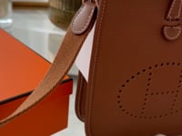 Hermès 2024 Evelyne 16 crossbody bag in Clemence leather, perforated H logo, with a crossbody strap, original dust bags and a original box, available in Cyprus at HOUSE of MICY